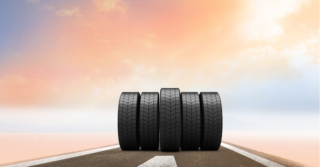 Free photo tires on the road at sunset