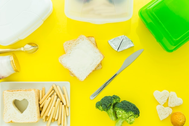 Toasts near lunchboxes and food