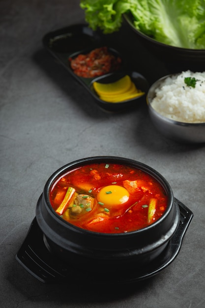 Tofu and yolk boiled in spicy soup