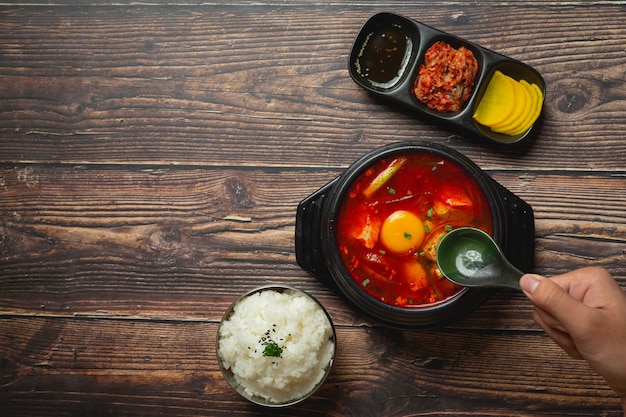 Free photo tofu and yolk boiled in spicy soup