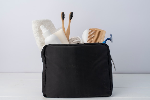 Free photo toilet bag and products arrangement