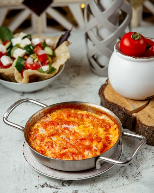 Tomato omellete and shepherd salad with cheese