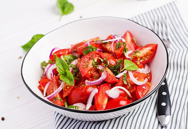 Tomato salad with basil and red onions