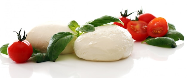 Free photo tomatoes, basil and mozzarella