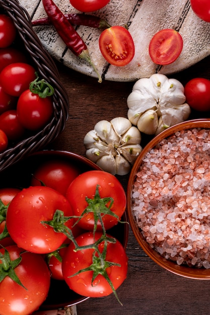 tomatoes garlic salt pepper top view