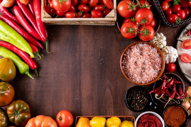 tomatoes peppers salt garlic with copy space arranged in frame