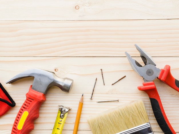 Tools of carpenter on wooden desk