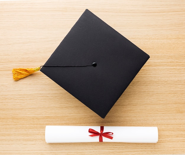 Top view of academic cap and diploma