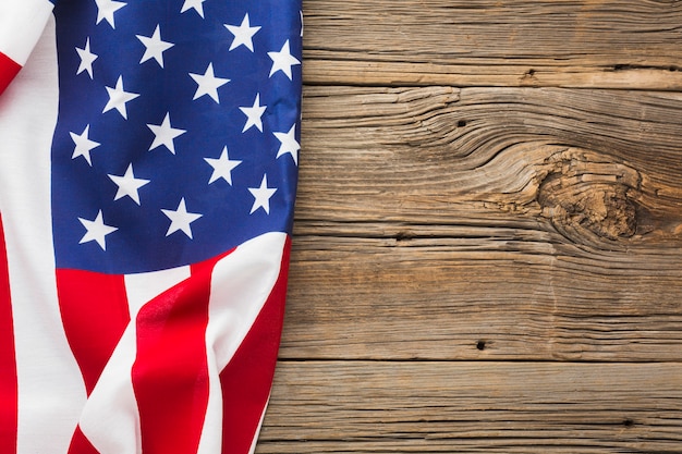 Free photo top view of american flag on wood with copy space