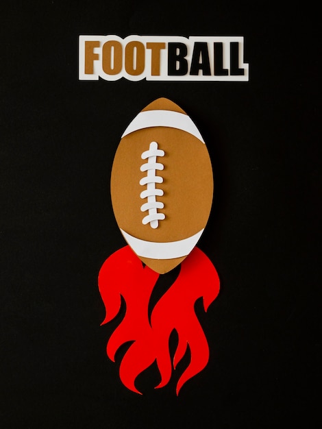 Free photo top view of american football with flames