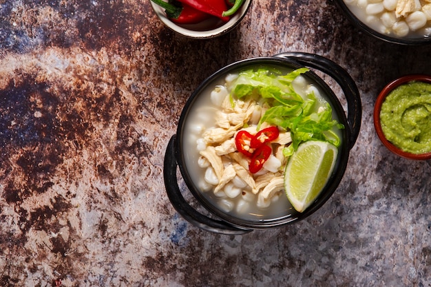 Free Photo top view on appetizing pozole bowl