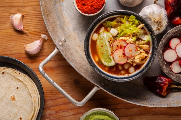 Free Photo top view on appetizing pozole bowl