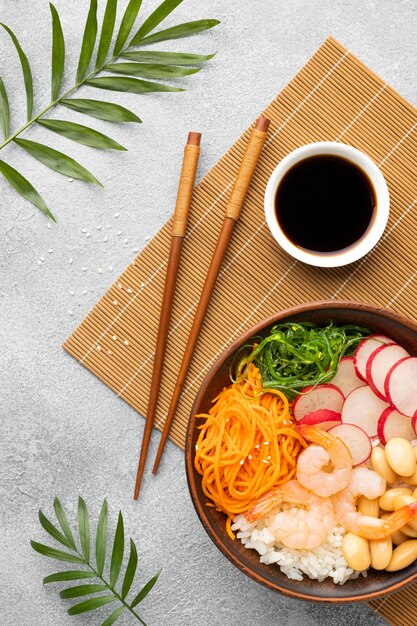 Top view arrangement of delicious poke bowl