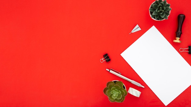 Top view arrangement of desk elements with copy space