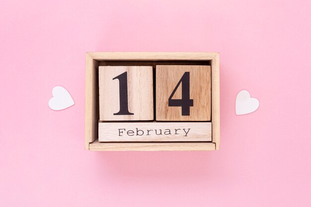 Free photo top view arrangement for valentine's day with pink background