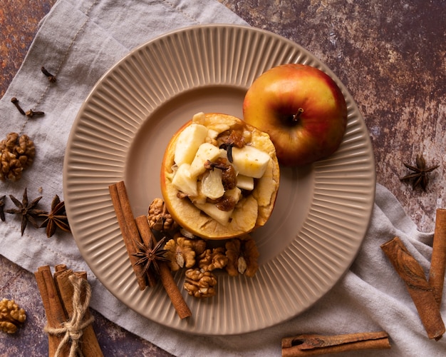 Top view arrangement with delicious apple and cinnamon sticks