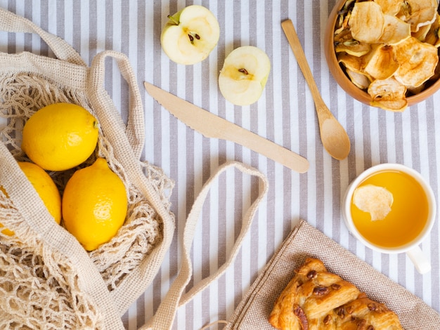 Top view arrangement with fruits and pastry