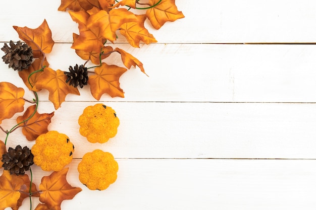 Free Photo top view arrangement with leaves and pine cones