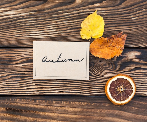 Free Photo top view arrangement with orange and leaves 