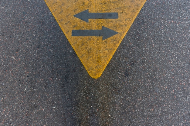 Top view asphalt arrows on street