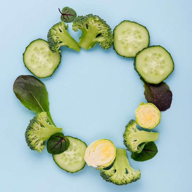 Free photo top view assortment of cucumber slices with copy space