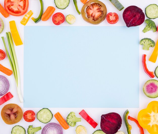 Top view assortment of organic vegetables with copy space