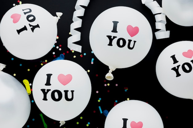 Free photo top view assortment with white balloons