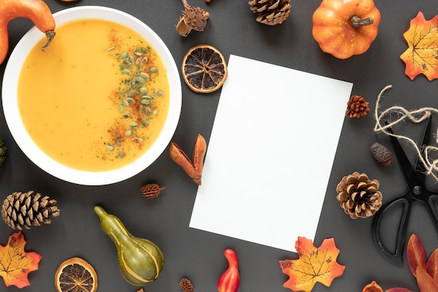 Free Photo top view autumn arrangement with pumpkin soup