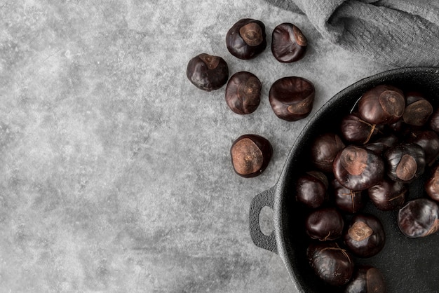 Top view of baked chestnuts with copy space