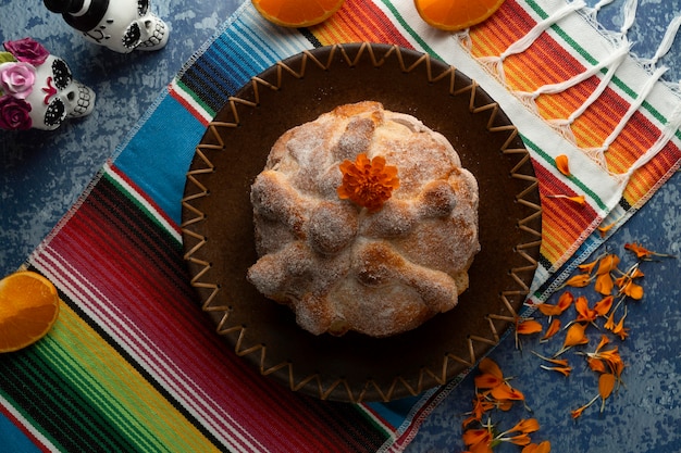 Free Photo top view of baked pan de muerto