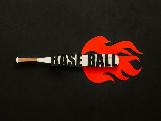 Free photo top view of baseball bat with flames