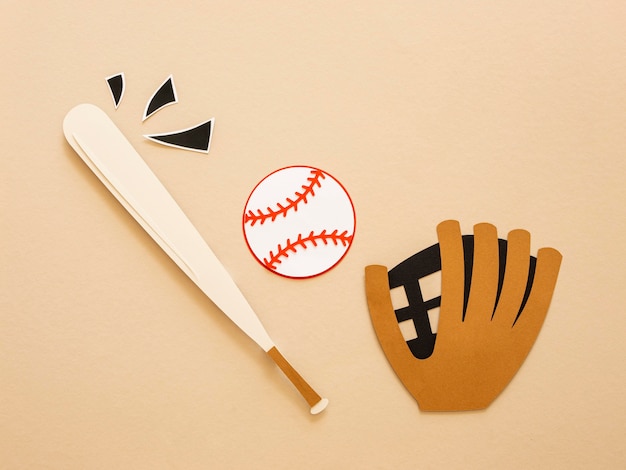 Top view of baseball bat with glove and ball