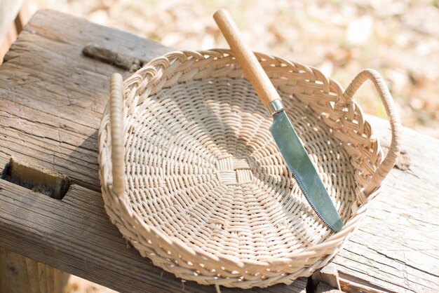 Top view of basket with a knife