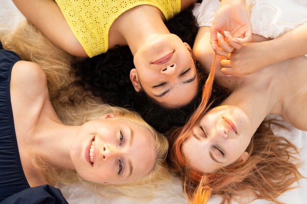 Top view of beautiful smiling girls