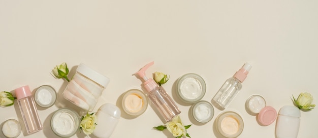 Top view of beauty products banner with bottles moisturizers