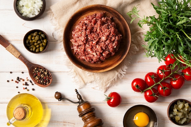 Top view beef steak tartar still life