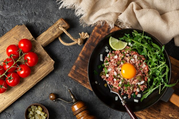 Top view beef steak tartar still life