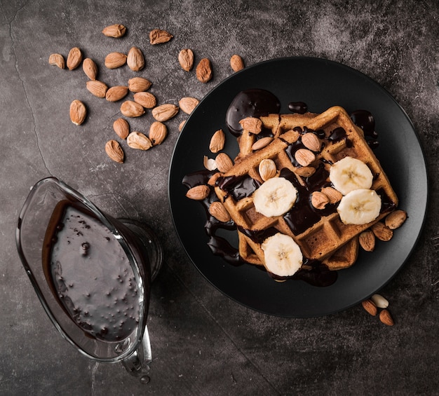 Top view belgian waffle with banana