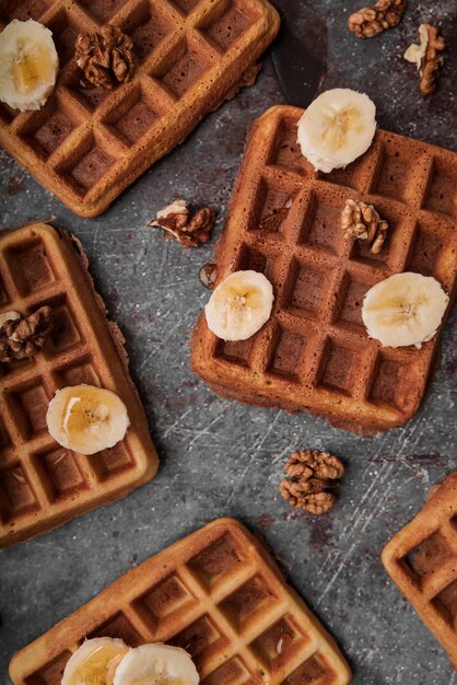 Top view belgian waffles with banana