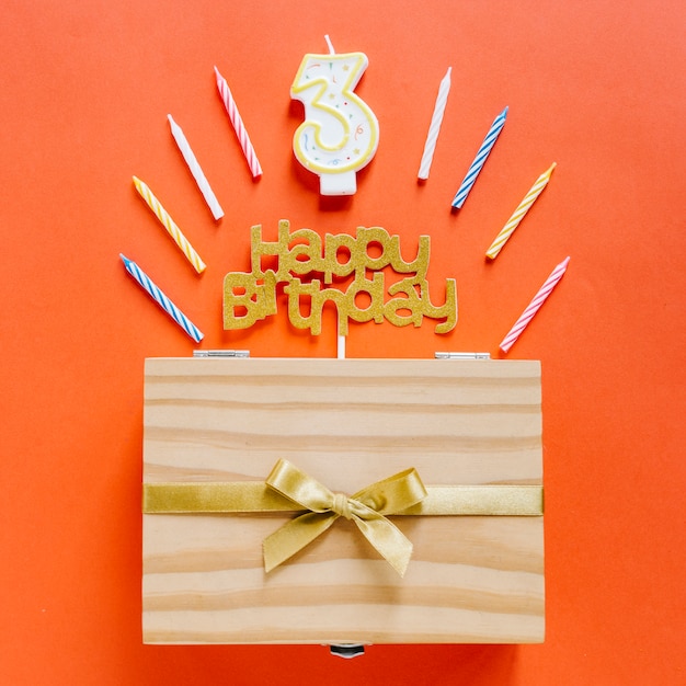 Free photo top view birthday candle with wooden box