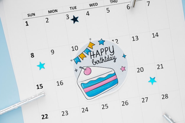 Free photo top view of birthday memo added in vibrant calendar