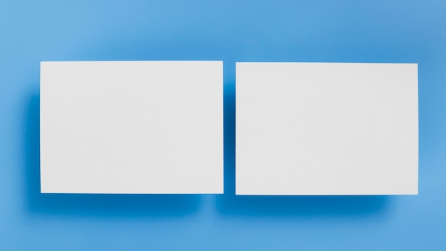 Free Photo top view blank business cards concept