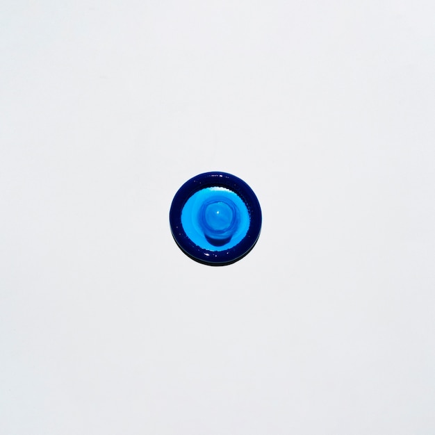 Free Photo top view blue condom on white background