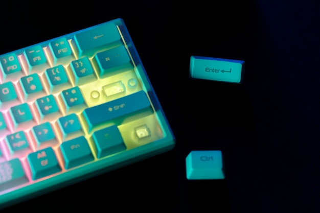 Free photo top view blue keyboard with lights