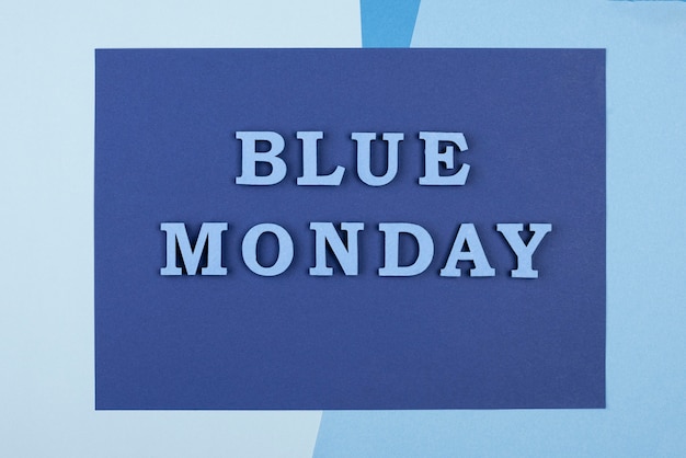 Free photo top view of blue monday paper