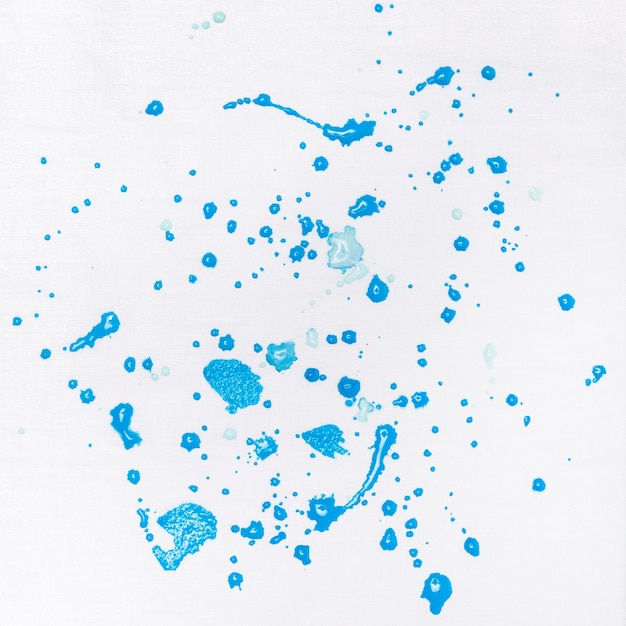 Free Photo top view blue paint splash