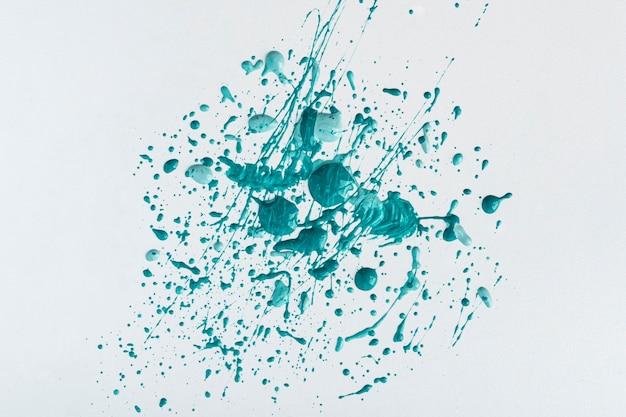 Top view of blue paint splatters