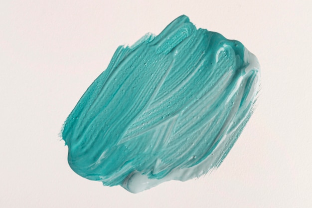 Top view of blue paint with brush strokes