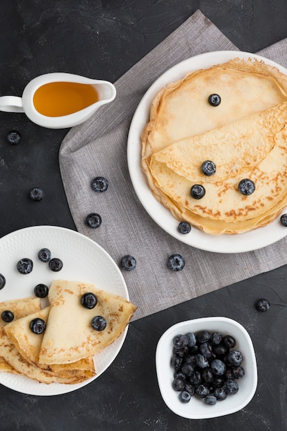 Free Photo top view blueberries on pancakes