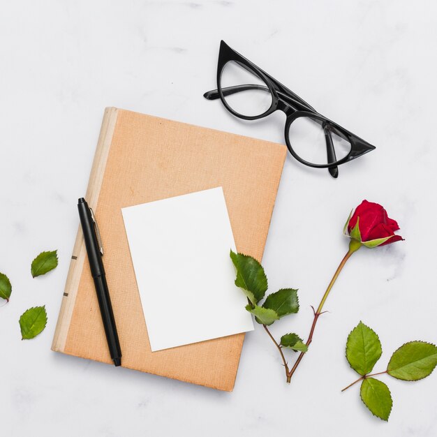 Top view of book and flowers